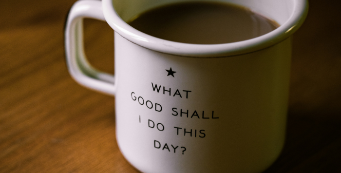 A mug of tea which says 'What good shall I do this day?' on the mug