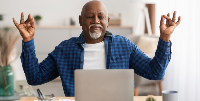 Man using a laptop at home