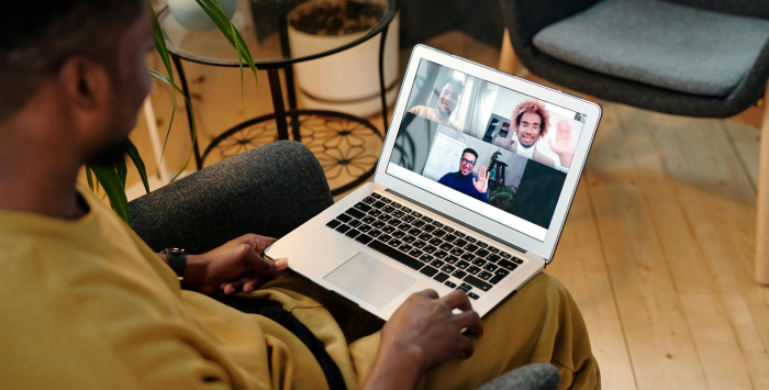 Man talking on laptop