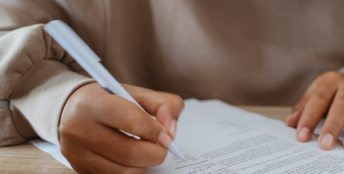 Person signing paperwork